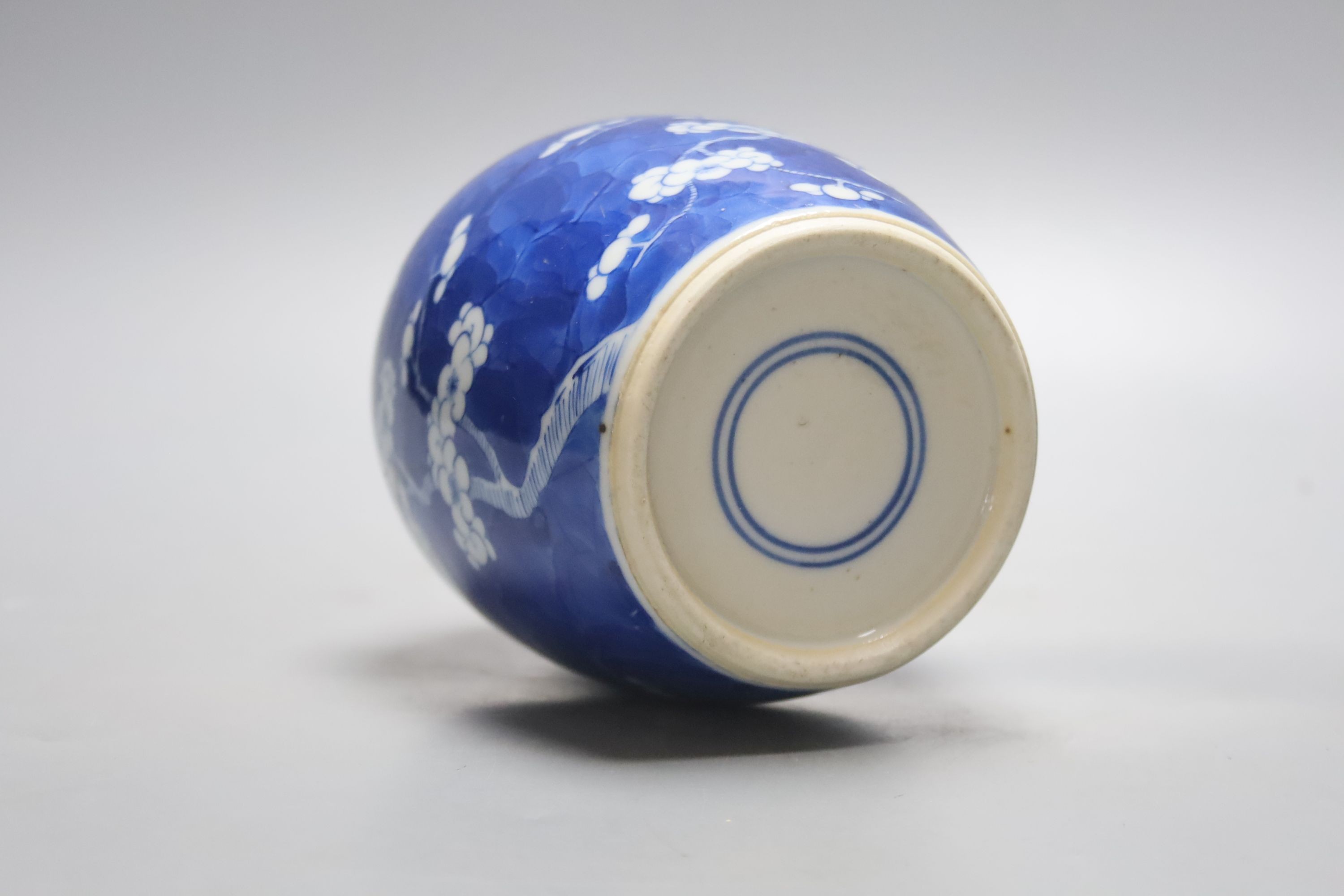 A 19th century Chinese blue and white prunus jar 13.5cm